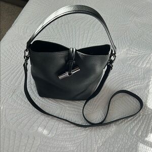 Elegant Black Leather Longchamp Handbag